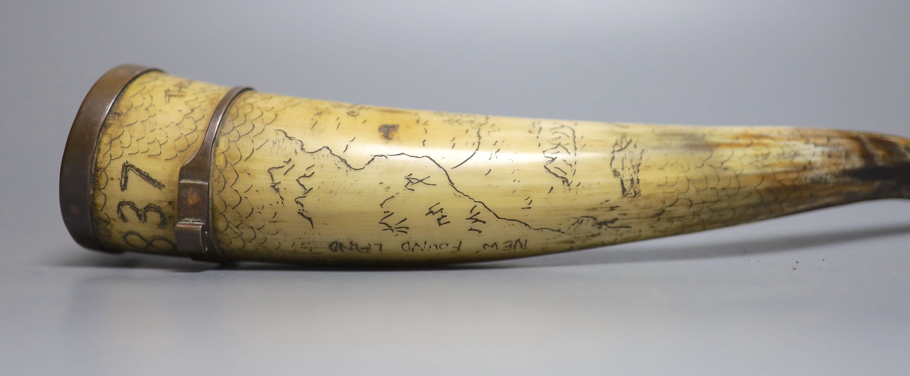 A scrimshaw horn beaker, bearing date 1837, 28cm